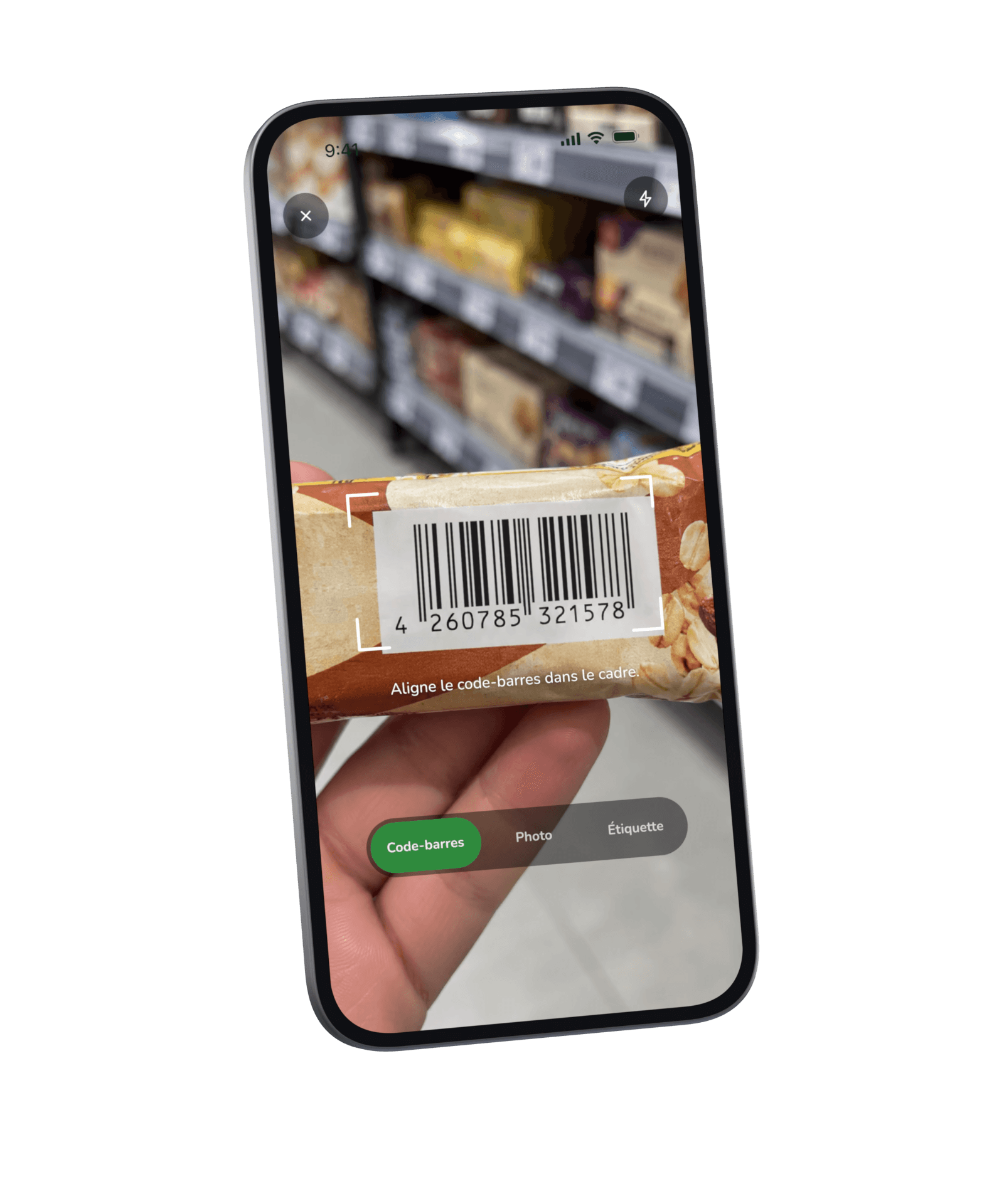 Le scanner : le code-barres d’un emballage cadré dans le viseur, avec les modes Code-barres, Photo et Étiquette en dessous.